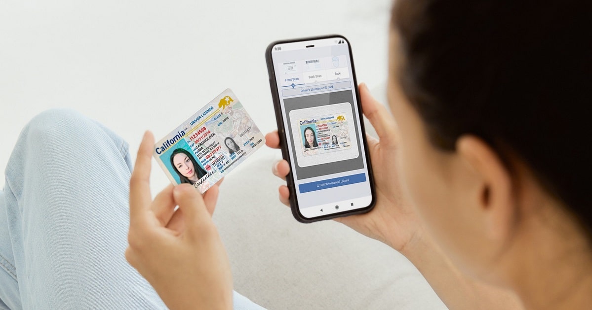 Person using cell phone to digitally verify identity as a service